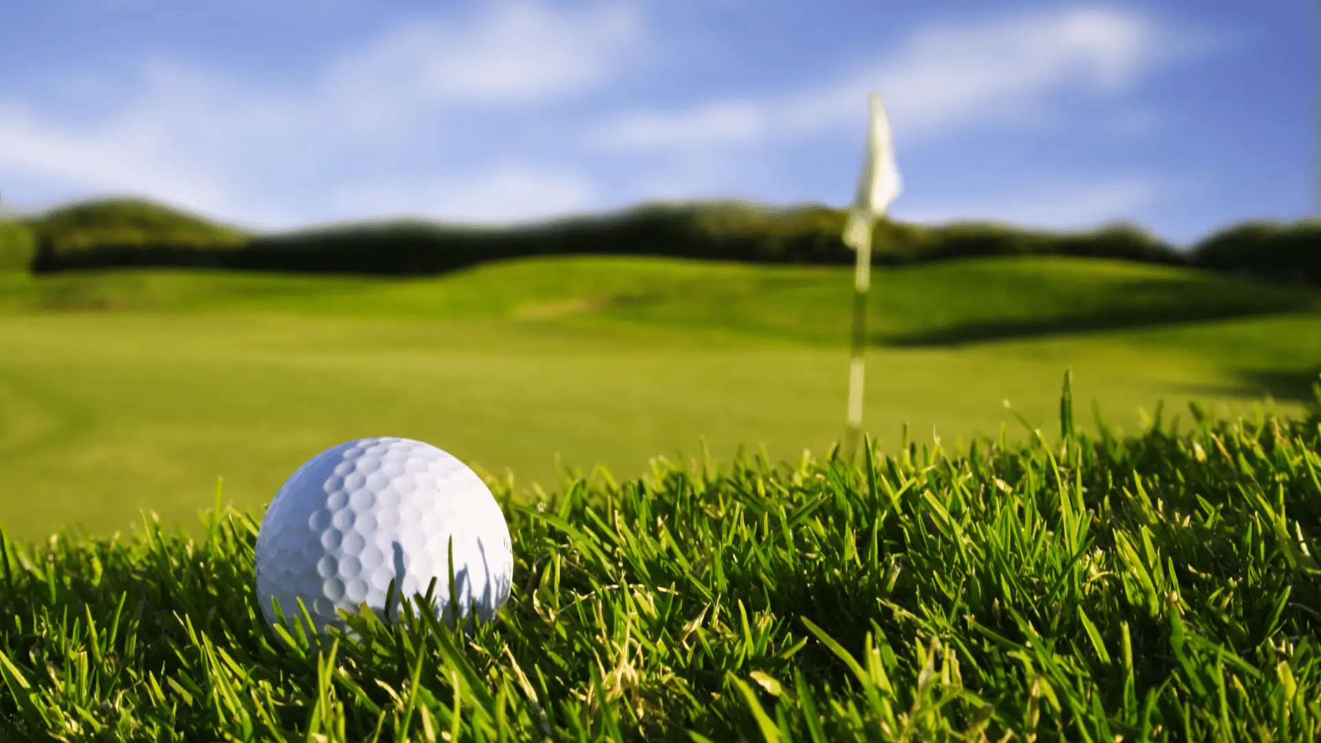 Best Golf Balls for Senior Women, Golf Ball shown sitting in fairway near the green.