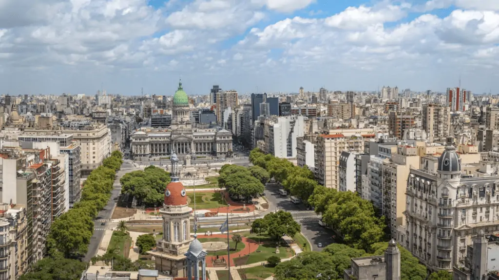 Photo of the tall city buildings and green space in Buenos Aires.