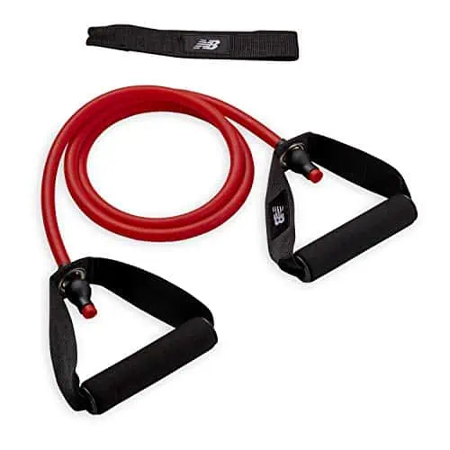 Resistance band shown in red.  Use of Resistance bands can be some of the best golf exercises for seniors since they are low impact and easy to use.