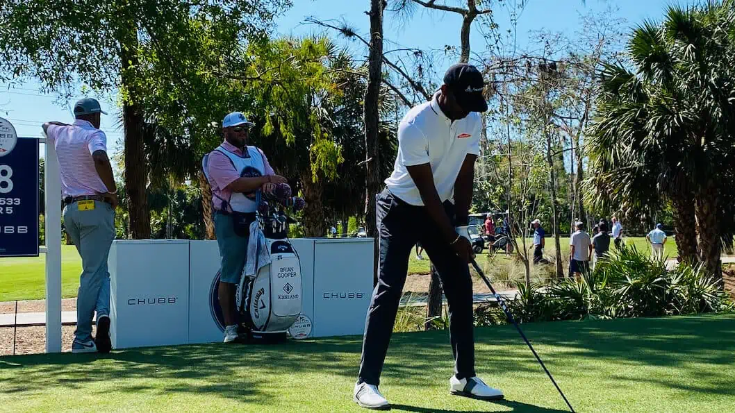 Young senior golfers to super senior golfers all benefit from warm up exercises. Showing Timothy O'Neal senior golfer born in 1972 teeing off at the Chubb Classic in 2023.