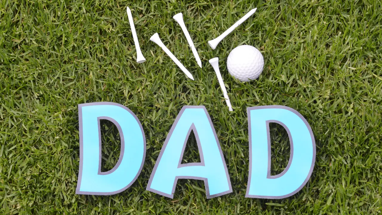 Father's Day Golf Gifts article showing Dad written out next to a pile of tees, golf ball, and wording that reads Dad.