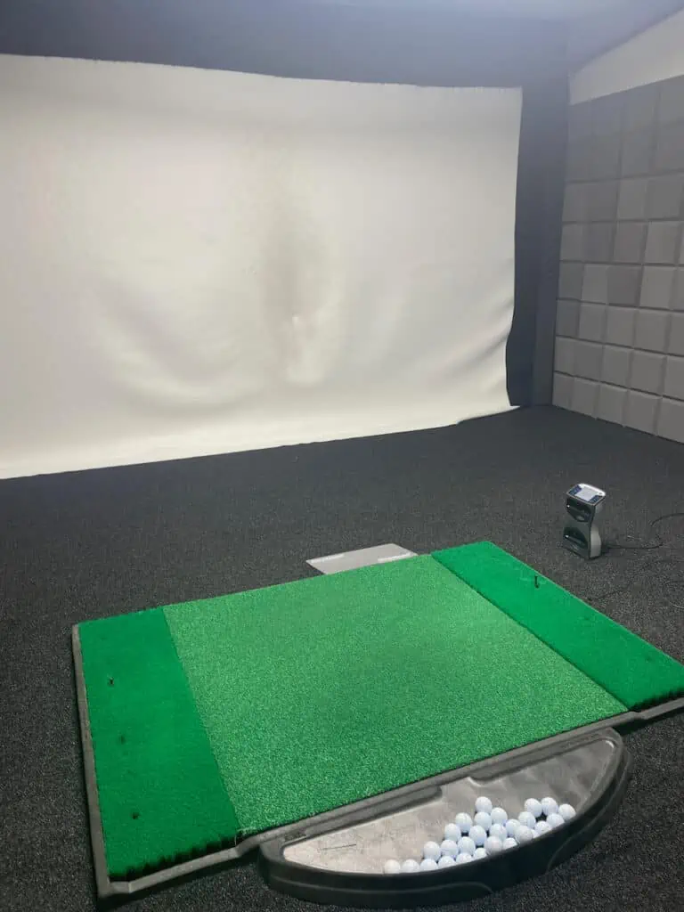 Golf Tec lesson setup with golf simulator  in the hitting bay