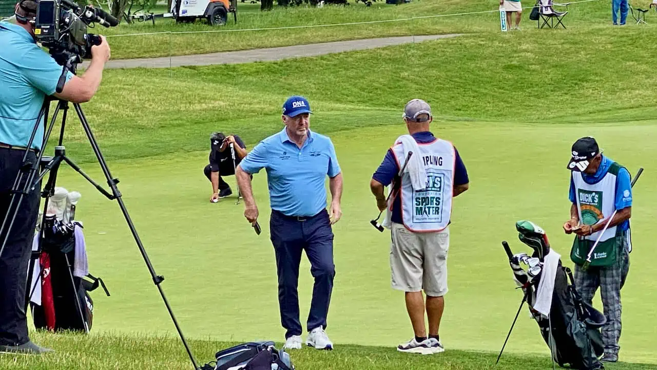 Rod Pampling WITB article showing Rod coming off the 9th hole on the En-Joie Golf Course in New York 2023. He is talking with his caddie, Perry Cameron.