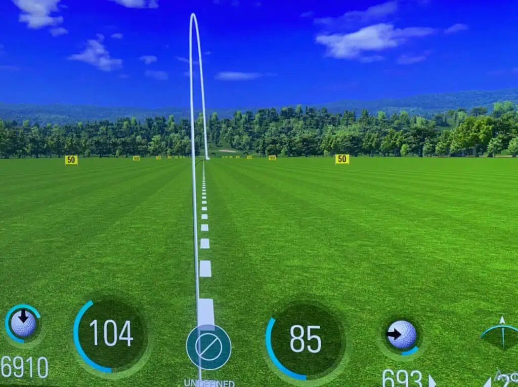 Fade in Golf is shown on a golf simulator screen.
