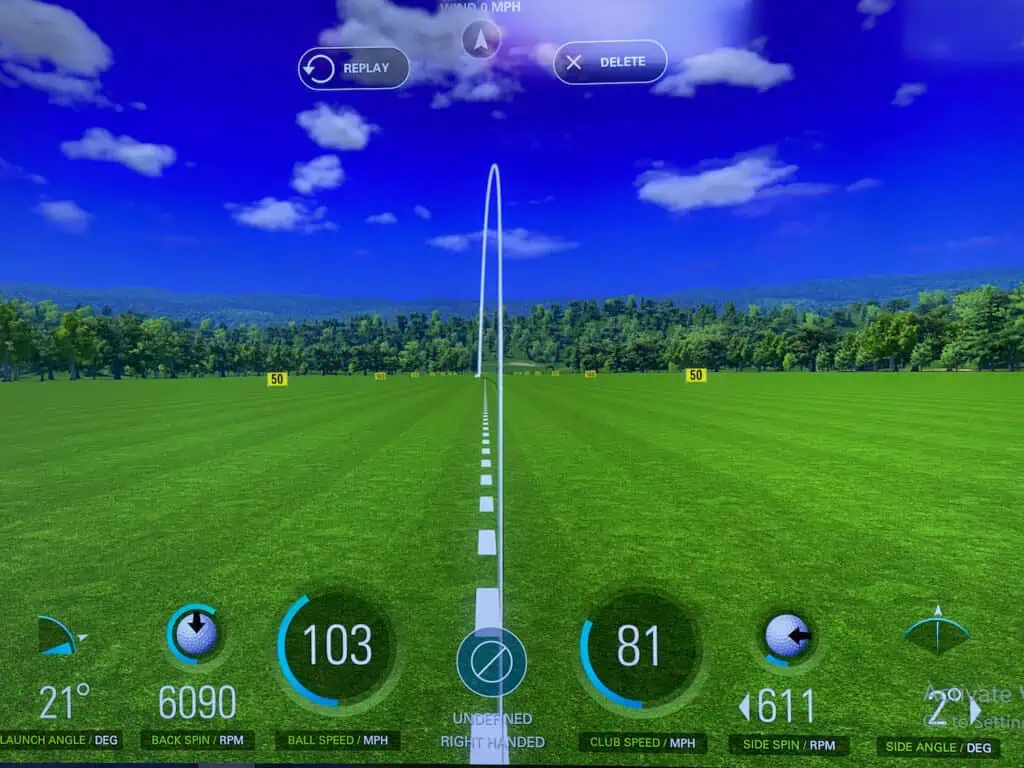Draw in Golf is shown on a golf simulator screen.