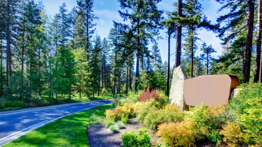 Suncadia entrance surrounded by trees  - Best Retirement Golf Community in Washington State