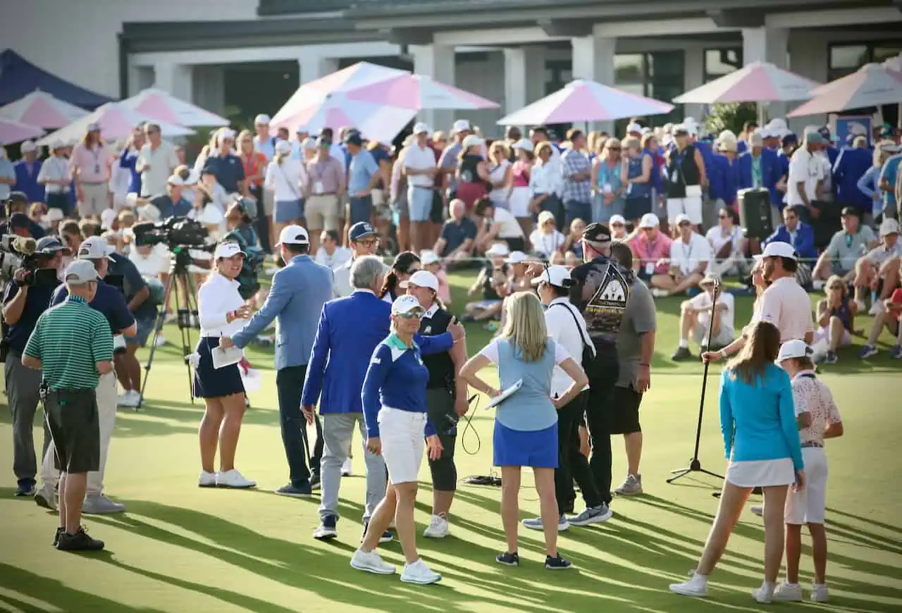 The Annika Tournament showing Annika Sorenstam standing in the middle of a large audience at the awards gathering in 2023.
