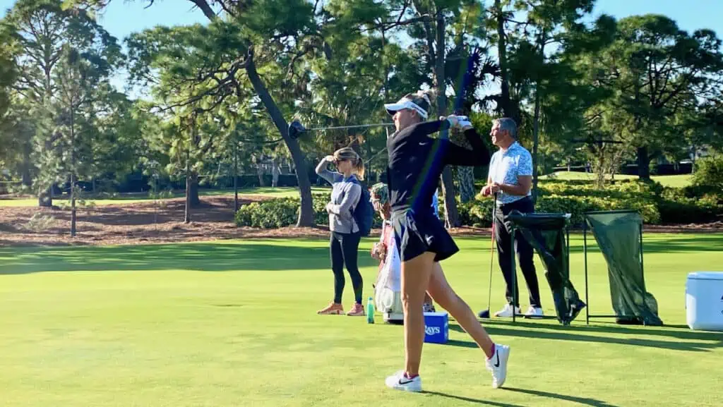 Nelly Korda hitting her golf driver from tee box in November 2023.