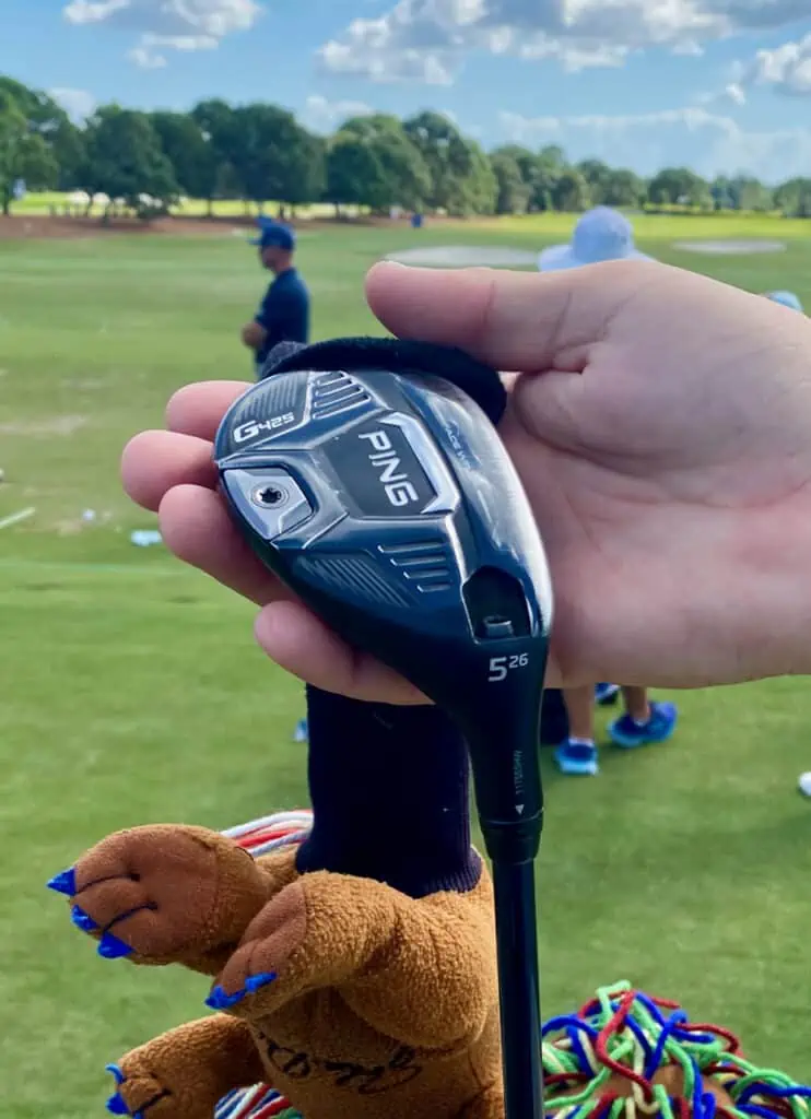 Nelly Korda WITB showing her Ping 5 Hybrid in her caddie, Jason's hands.  