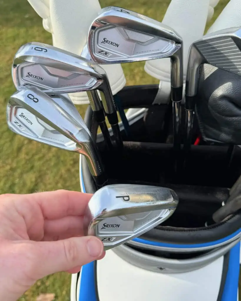 Srixon ZX7 MK ii Irons shown holding the pitching wedge 