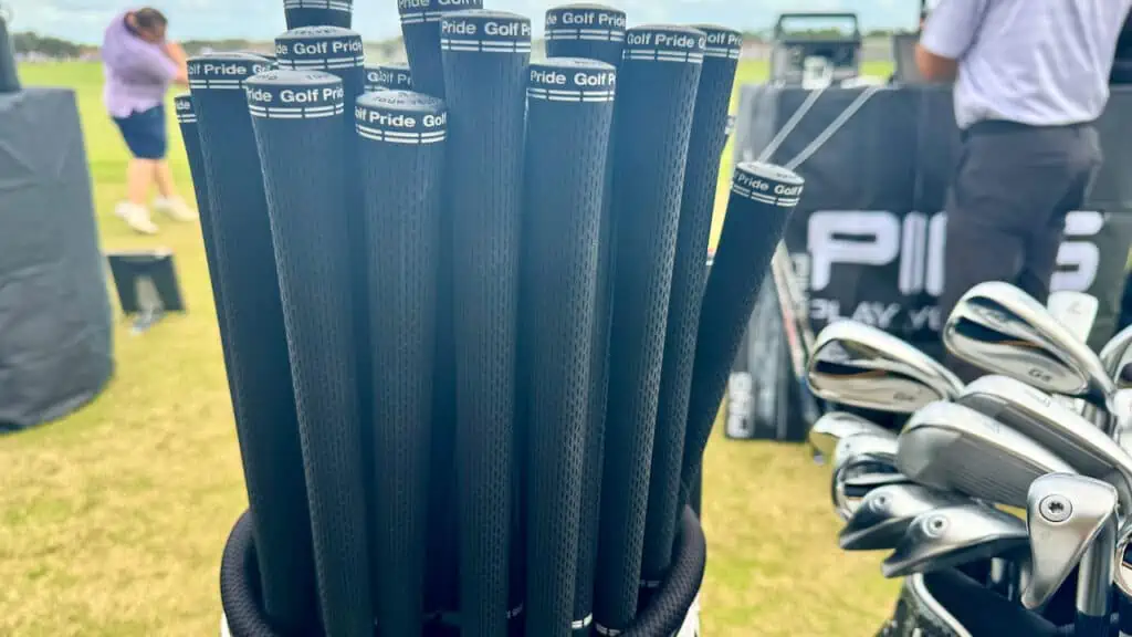 showing close up of a bag of golf grips and golf irons