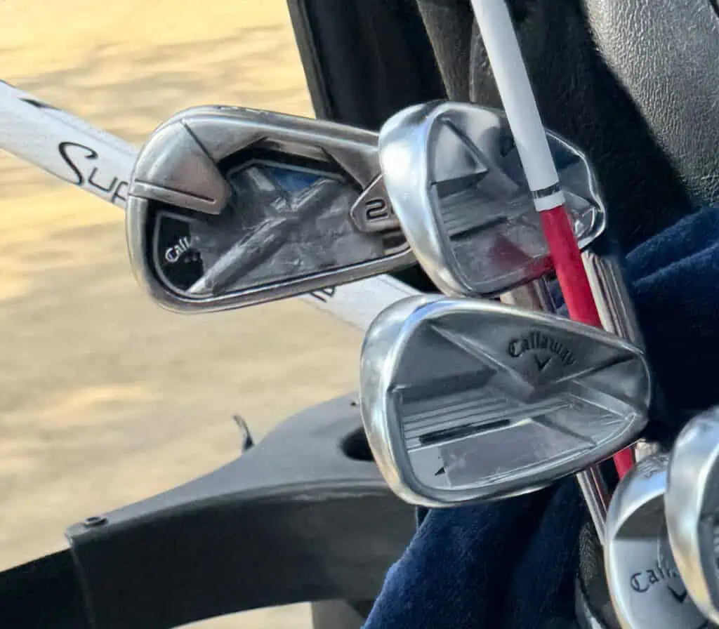 Callaway X22 3 iron shown with lead tape covering most of the clubface in Alex Cejka's golf bag.