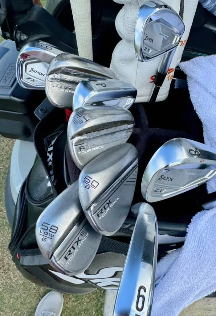 Cleveland RTX 6 Tour Rack Zipcore Wedge and showing his irons and other wedges next to it.