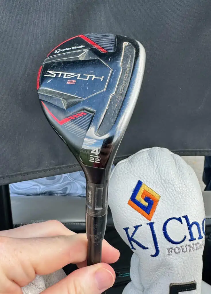 TaylorMade Stealth 2 Hybrid in KJ Choi what's in the bag by Senior Golf Source with his head cover in the background
