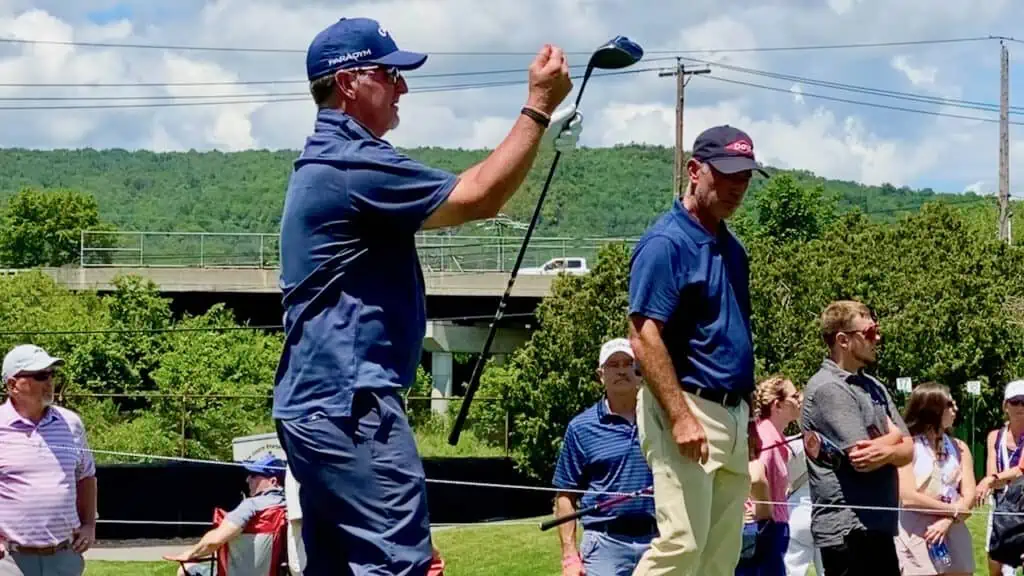 David Duval holding up his Paradym Driver at the En-Joie Golf Club while standing on the tee box.