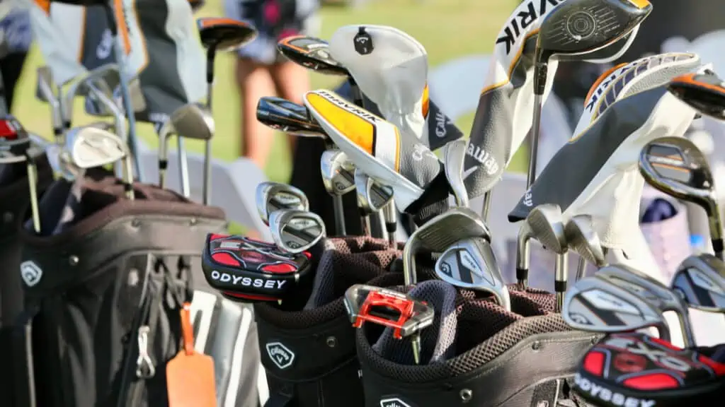 Golf clubs for seniors in multiple golf bags taken by Senior Golf Source