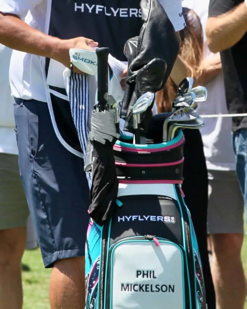 close up of his irons in his bag